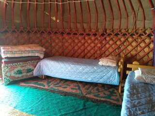 Кемпинги Karakol Yurt Lodge Каракол Трехместный номер с общей ванной комнатой-9
